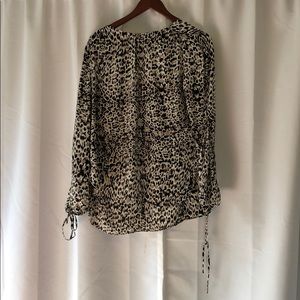 Animal print open sleeve top